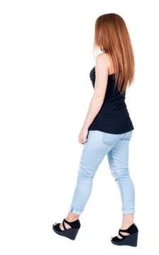 Back view of walking  woman Stock Photos
