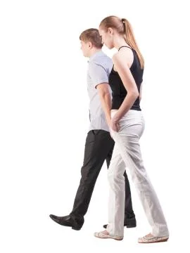 Back view of walking  young couple Stock-Fotos