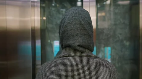 Back View Woman Inside Elevator During Ascent Stock Footage 310149079