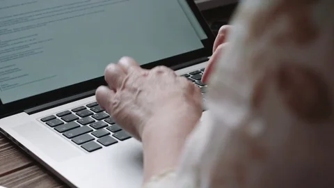 Back view of woman using laptop Stock-Footage 74996034