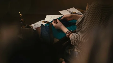 Back view of the workers hands make handmade jewelry Stock-Footage 73951733