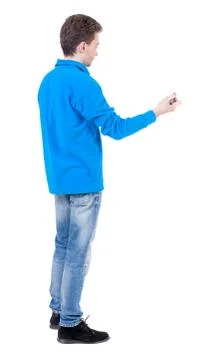 Back view of writing business man Foto stock