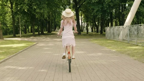 Back view of young beautiful  hipster girl in trendy summer sundress Vídeo Stock 142427332