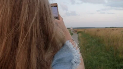 Back view of Young Beautifull Blond Woman travelling to Church of the Stock Footage 92460714
