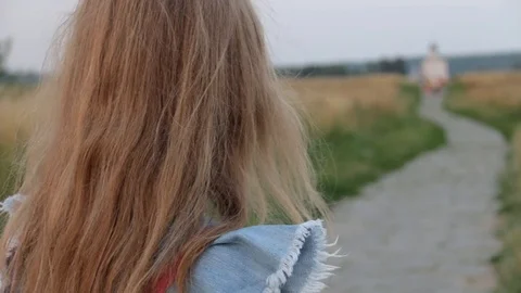 Back view of Young Beautifull Blond Woman travelling to Church of the Stock Footage 92460937