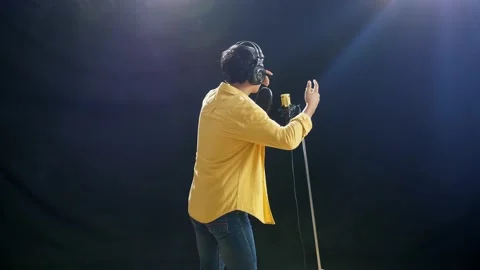 Back View Of A Young Boy With Headphone ... | Stock Video | Pond5