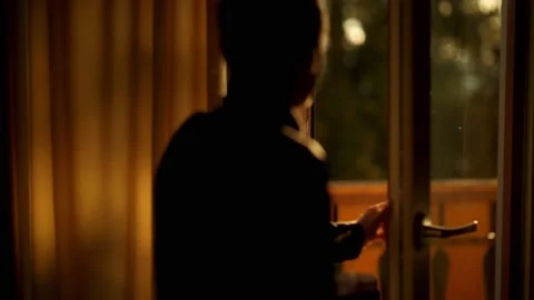 Back view of a young man with hot tea on a balcony Stock Footage 201165024