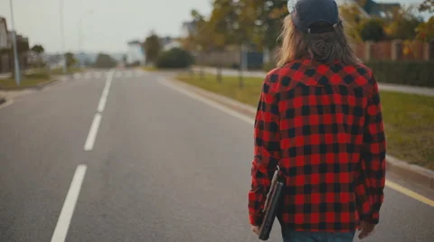 Back View Young man with laptop computer in the city Stock Footage 67501989