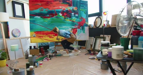 Back view of young talented Caucasian woman modern fine art artist working Stock Footage 149573406