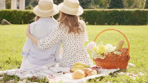 Back view.Two young beautiful hipster woman in trendy summer sundress Stock Footage 142570428