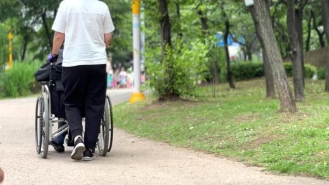 The back of a wheelchair walker Stock Footage 242648951