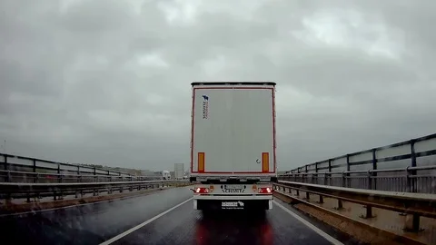 The back of the white truck on the streets Stock Footage 92046450
