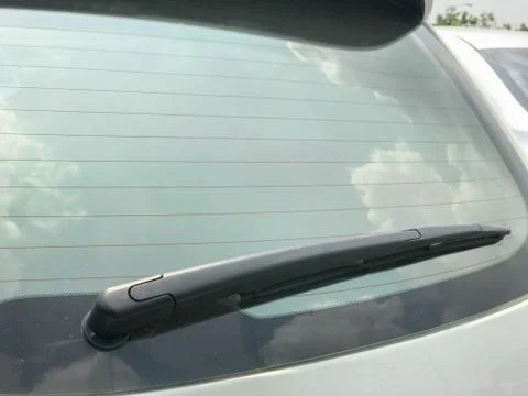 Back windshield wiper of the modern car Stock Photos