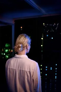 Back, woman and programmer with mainframe in server room for inspection, cy.. Stock-Fotos