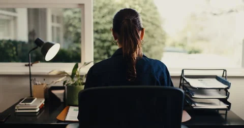 Back, woman and remote work in home office with paperwork, finance Stock Footage 342222601