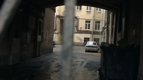 The back yard of an apartment building through the bars Stock Footage 73503972