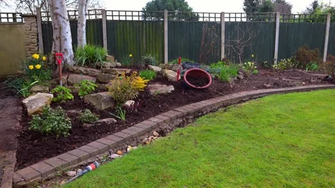 Back yard garden mulched with home made compost Stock Footage 321462765