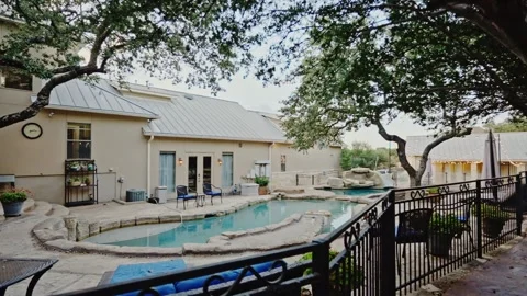 A back yard pool with trees Stock Footage 260005139