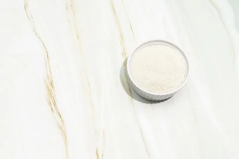 Backdrop Celtic Gray Sea Salt In A White Ceramic Bowl On Granite Table. Natural Stock Photos