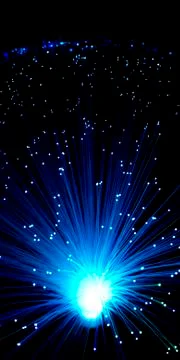 Backdrop of lights of colored fiber optics galaxy stars Stock Photos