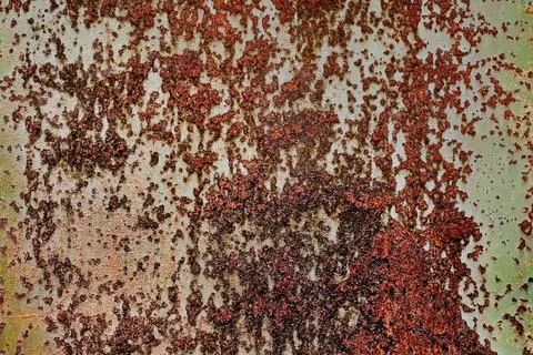 Backdrop of rusty surface of dark, brown, and orange hues. Detailed grunge Stock Photos