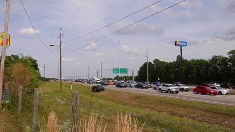 Backed up Traffic front facing jam on a busy highway Stock Footage 153612074