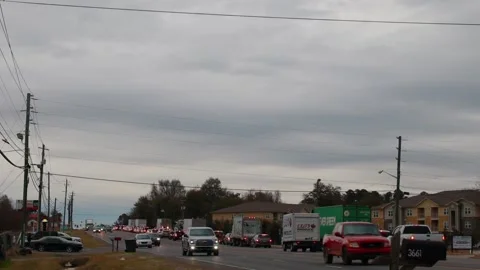 Backed up traffic jam due to road construction on Peach Orchard road in the e Stock Footage 148745794