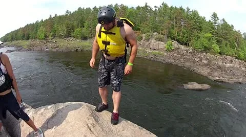 Backflip 360 off cliff into water Stock Footage 20603563