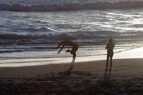 Backflips on the beach Foto stock