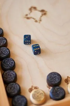 Backgammon board with chips and cubes Stock Photos