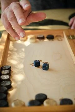 Backgammon board with chips and cubes in flight Stock Photos