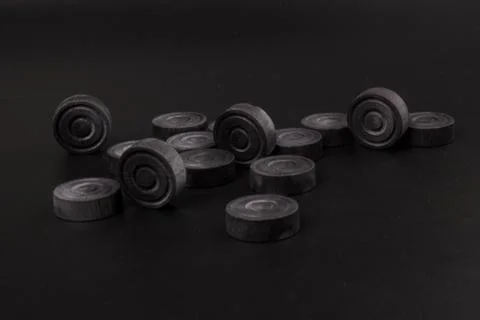 Backgammon. Board game. Black chips for playing on  black background. Game fo 写真素材