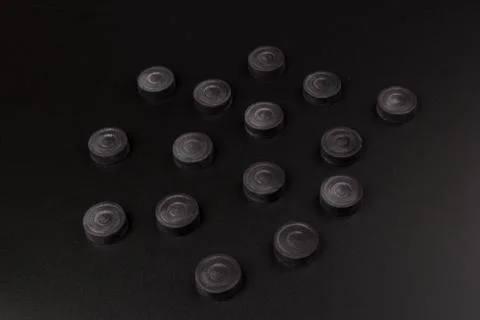 Backgammon. Board game. Black chips for playing on  black background. Game fo 写真素材