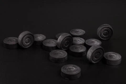 Backgammon. Board game. Black chips for playing on  black background. Game fo 写真素材