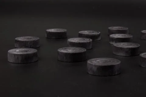 Backgammon. Board game. Black chips for playing on  black background. Game fo 写真素材