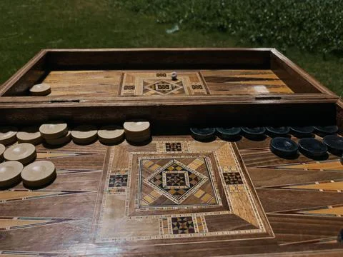 Backgammon Board game - closeup of a backgammon - Playing leisure games Stock Photos