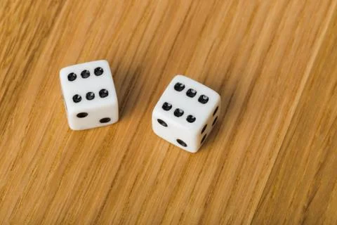 Backgammon dices on wood background 写真素材
