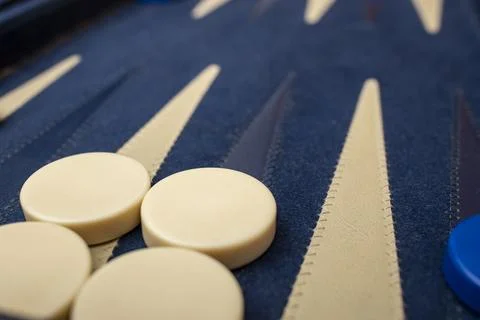 Backgammon game close up with blue felt and leather Stock Photos