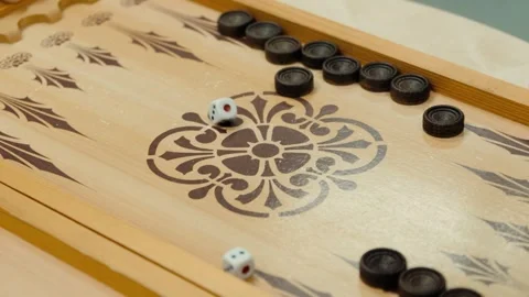 Backgammon game with dice and checkers on wooden board Stock Footage 318076009