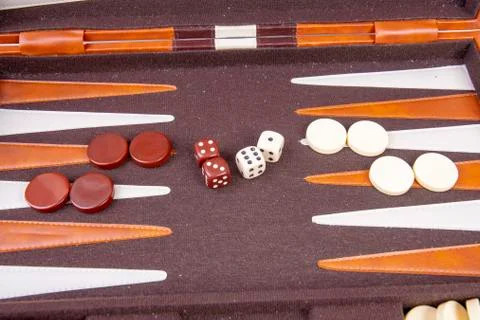 Backgammon game with dice and game pieces Stock Photos