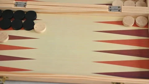 Backgammon game pieces on a classic wooden board Stock Footage 290051160