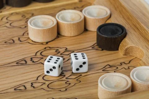 Backgammon playing field and dices Stock Photos