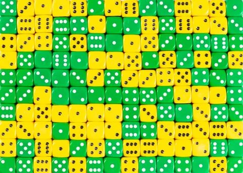 Background of 140 random ordered green and yellow dices Stock Photos