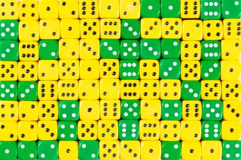 Background of 140 random ordered green and yellow dices Stock Photos