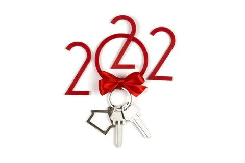Background 2022 New year and Christmas. Banner with keys and keychain. Real e Stock Photos