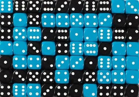 Background of 70 random ordered black and blue dices Stock Photos