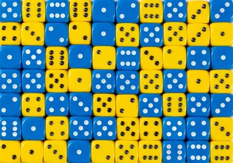 Background of 70 random ordered blue and yellow dices Stock Photos