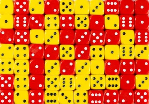 Background of 70 random ordered red and yellow dices Stock Photos