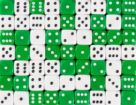 Background of 70 random ordered white and green dices Stock Photos