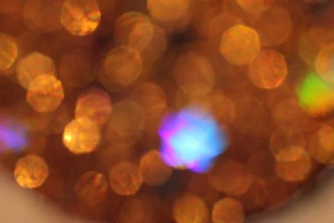 Background of abstract glitter lights. gold, blue red, pink,and black. de foc Stock Photos